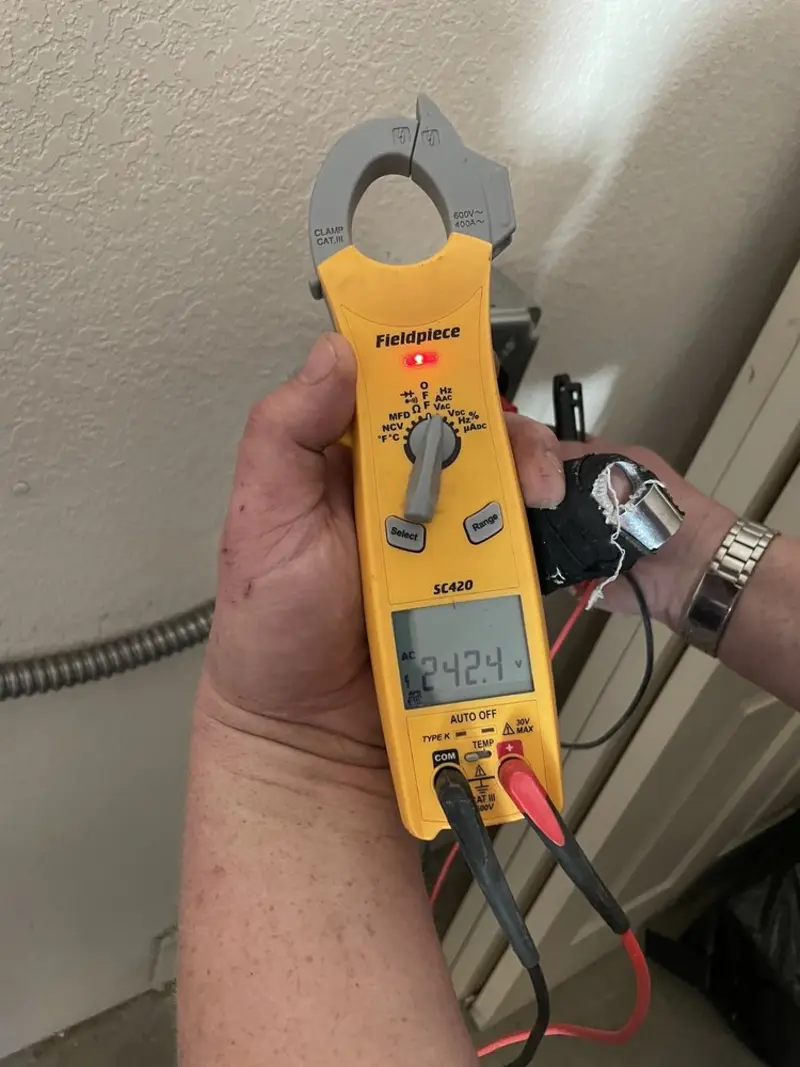Voltage testing with clamp meter during Electrical Installation Services in La Verne